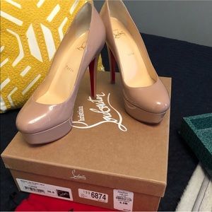 Authentic Christian Louboutin pumps.
